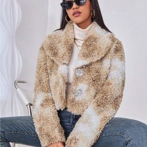 Fluffy white and brown coat